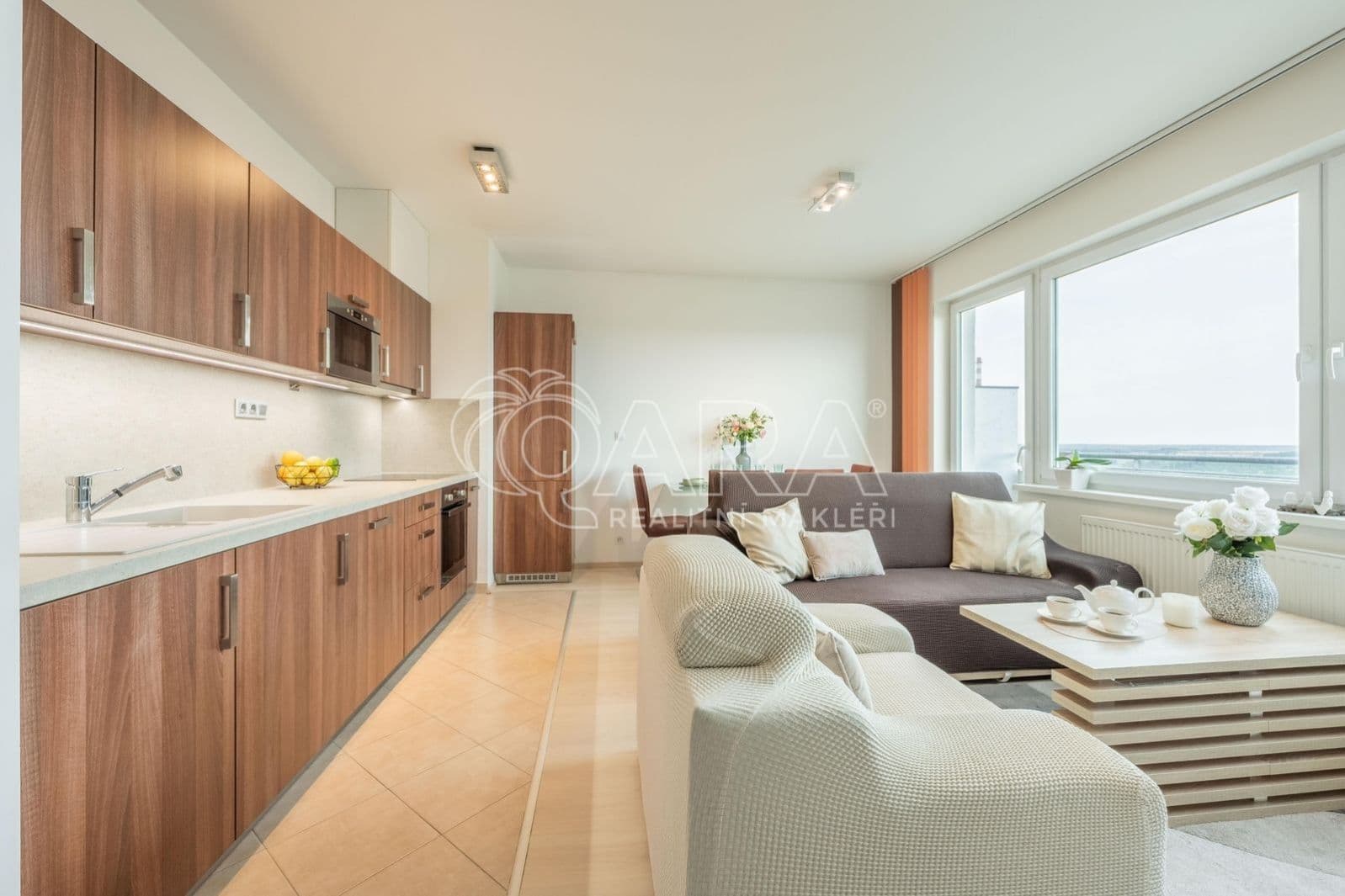 PRODÁNO – Moderní byt 2+kk, 50 m², terasa 7 m², 12. patro, garážové stání, sklep – Mantovská, Horní Měcholupy